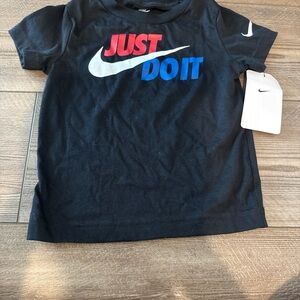 Nike Kids Black Tee with Red and Blue 'Just Do It' Design